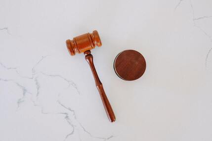 Picture of gavel on marble counter